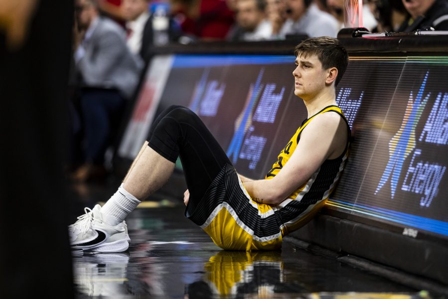 Iowa forward Patrick McCaffery reacts while waiting to enter the matchup during a men’s basketball game between Iowa and Wisconsin at Carver-Hawkeye Arena in Iowa City on Sunday, Dec. 11, 2022. McCaffery played for 33 minutes and 12 seconds. The Badgers defeated the Hawkeyes in overtime, 78-75.