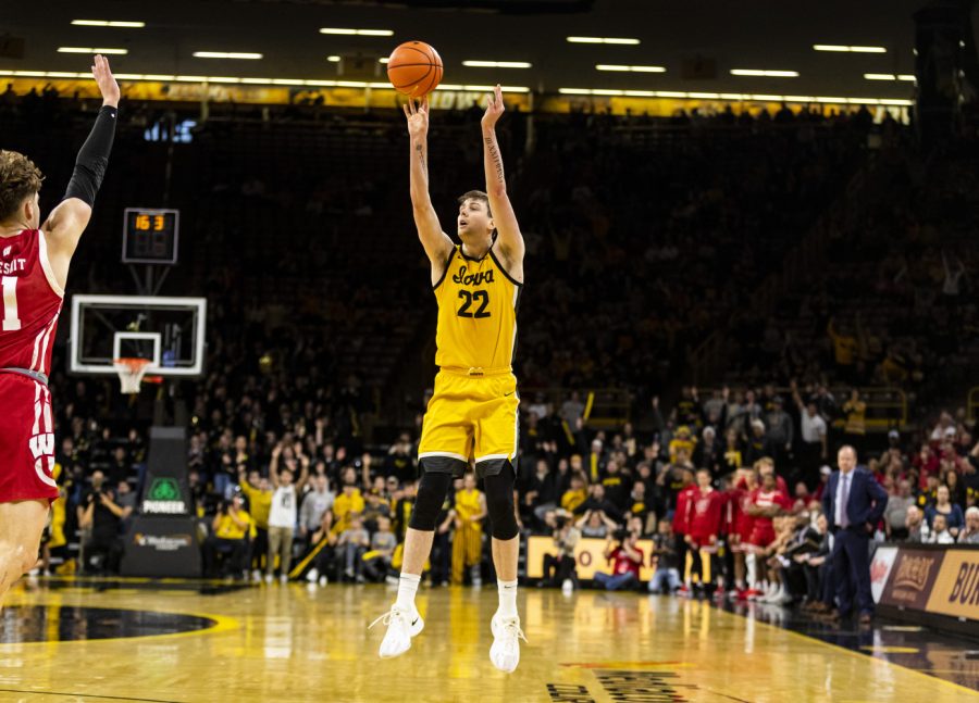Iowa+forward+Patrick+McCaffery+shoots+a+3-pointer+to+take+the+Hawkeyes+and+the+Badgers+into+overtime+during+a+men%E2%80%99s+basketball+game+between+Iowa+and+Wisconsin+at+Carver-Hawkeye+Arena+in+Iowa+City+on+Sunday%2C+Dec.+11%2C+2022.+McCaffery+led+the+Hawkeyes+in+points+with+24.+The+Badgers+defeated+the+Hawkeyes+in+overtime%2C+78-75.