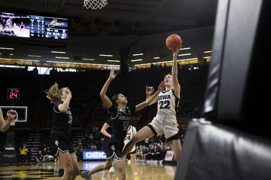 Iowa guard Caitlin Clark shoots the ball during a women’s basketball game between Iowa and Dartmouth at Carver-Hawkeyes Arena in Iowa City on Wednesday, Dec 21, 2022. The Hawkeyes defeated the Big Green 92-54
