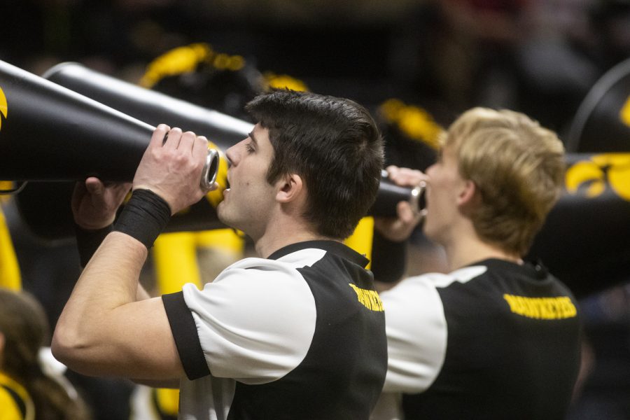 Iowa cheerleaders celebrates during a mens basketball game between Iowa and Southeast Missouri State at Carver-Hawkeye Arena in Iowa City on Saturday, Dec. 17, 2022. The Hawkeyes defeated the Redhawks, 106-75. (Darren Chen/The Daily Iowan)