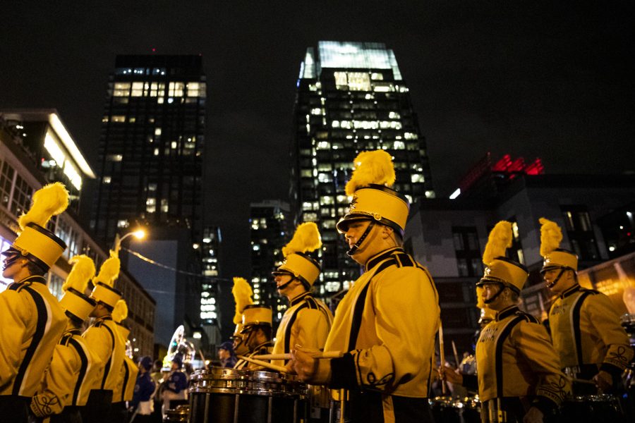 Iowa marches during Battle of the Bands for the 2022 TransPerfect Music City Bowl on Broadway in downtown Nashville on Friday, Dec. 30, 2022. Thousands of fans attended the event ahead of the matchup tomorrow in Nissan Stadium at 11 a.m. CT.