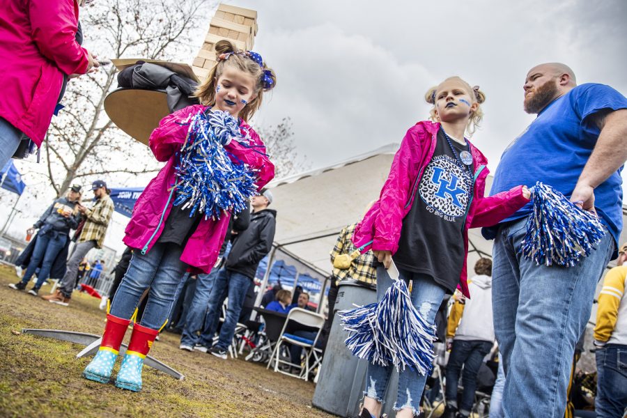 Kentucky fans Presleigh Keeney, 7, and Gracie Sult, 8, dance to music during a tailgate before the 2022 TransPerfect Music City Bowl at Nissan Stadium in Nashville on Saturday, Dec. 31, 2022. Sult predicted Kentucky to win the game, 28-10.