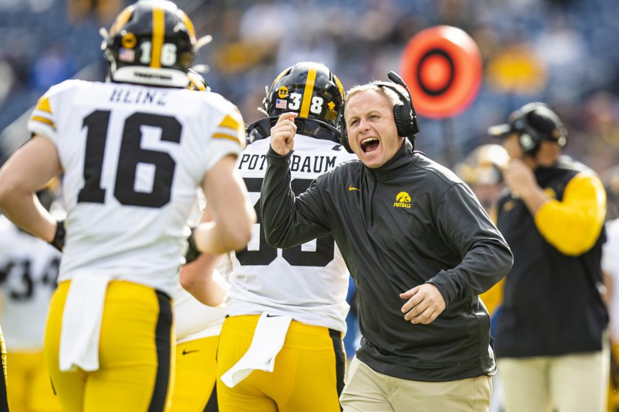 Iowa assistant defensive coordinator Seth Wallace yells at his players during the 2022 TransPerfect Music City Bowl at Nissan Stadium in Nashville on Saturday, Dec. 31, 2022. The Hawkeyes became the 2022 TransPerfect  Music City Bowl champions after defeating the Wildcats, 21-0.