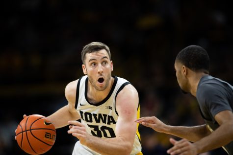 Iowa guard Connor McCaffery moves with the ball during a basketball game between Iowa and Georgia Tech at Carver-Hawkeye Arena on Tuesday, Nov. 29, 2022. The Hawkeyes defeated the Yellow Jackets 81-65.