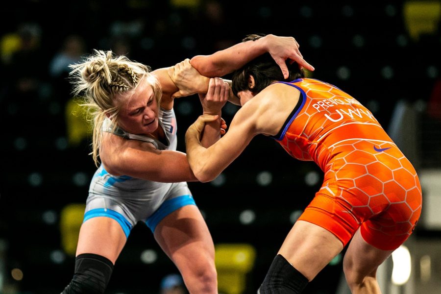 Felicity Taylor of the United States, left, wrestles Maria Prevolaraki of Greece at 53 kg during the United World Wrestling womens freestyle World Cup, Saturday, Dec. 10, 2022, at Xtream Arena in Coralville, Iowa.