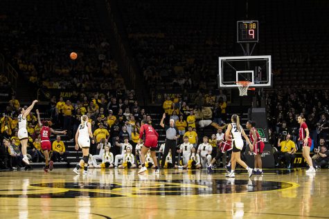Iowa guard Caitlin Clark shoots a 3-pointer during a women’s basketball game between No. 10 Iowa and No. 12 NC State at Carver-Hawkeye Arena in Iowa City on Thursday, Dec. 1, 2022. Clark led the Hawkeyes in points with 45. The Wolfpack defeated the Hawkeyes, 94-81. 
