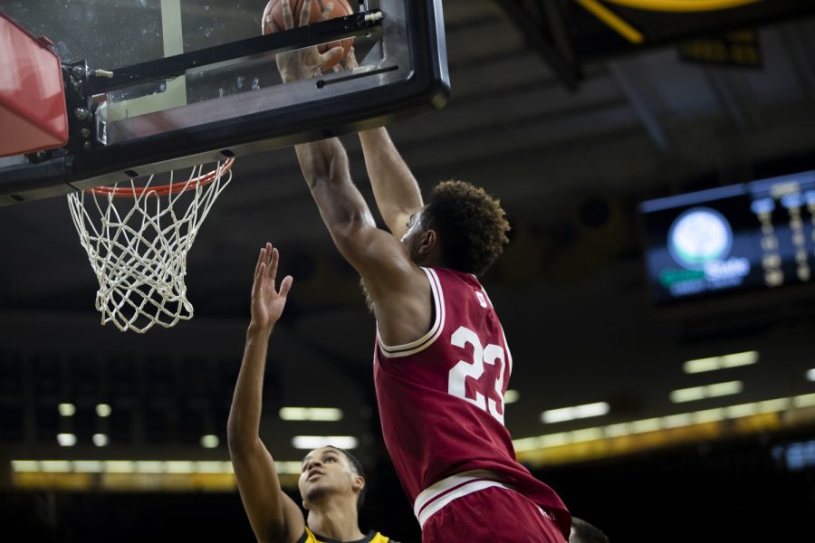 Indiana forward Trayce Jackson-Davis scores while Iowa forward Kris Murray attempts to block during a mens basketball game between Iowa and Indiana at Carver-Hawkeye Arena in Iowa City on Thursday, Jan. 05, 2023. The Hawkeyes defeated the Hoosiers, 91-89.