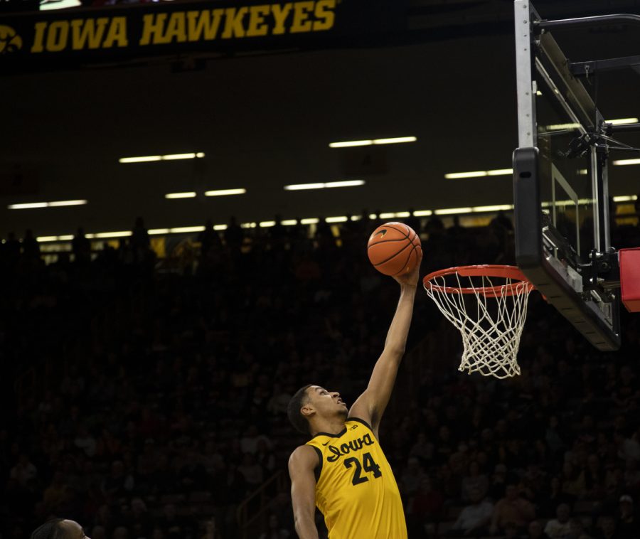 Iowa forward Kris Murray scores during a mens basketball game between Iowa and Indiana at Carver-Hawkeye Arena in Iowa City on Thursday, Jan. 05, 2023. The Hawkeyes defeated the Hoosiers, 91-89. 