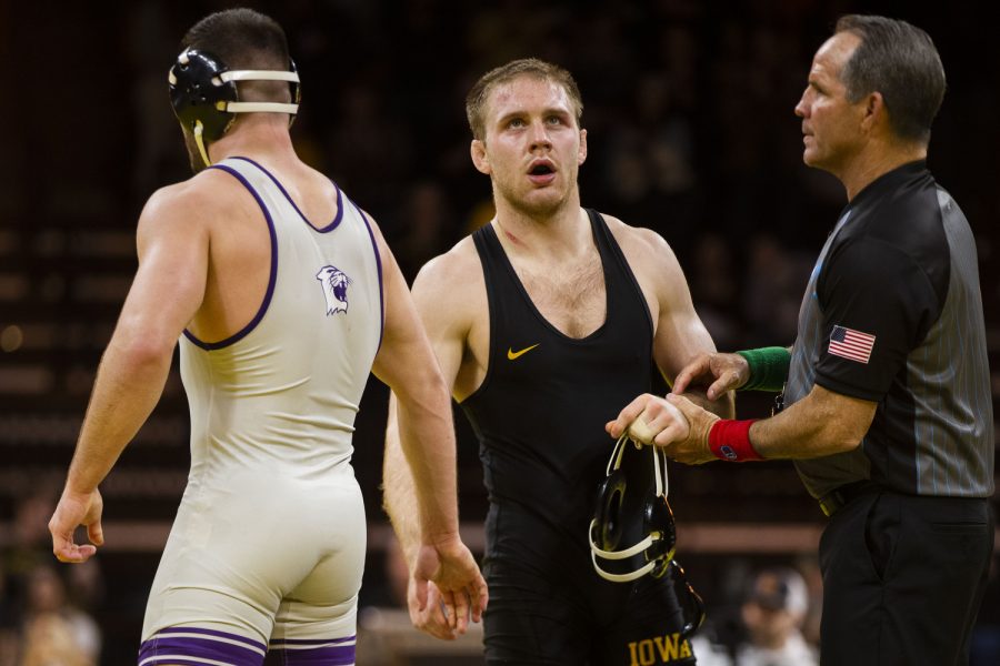 Iowa’s No.7 165-pound Patrick Kennedy wins a match over Northwestern’s No.19 Maxx Mayfield during a dual between Iowa and Northwestern at Carver-Hawkeye Arena in Iowa City on Jan. 14, 2023. The Hawkeyes defeated the Wildcats, 27-9. Kennedy defeated Mayfield, 4-2.