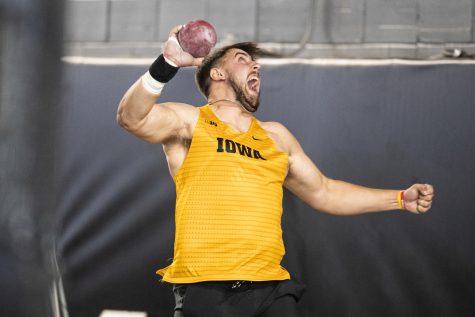 Iowa’s Jordan Johnson throws a shot-put during the Hawkeye Invitational at the University of Iowa Recreation Building in Iowa City on Saturday, Jan. 14, 2023. Johnson’s best throw went 17.46 meters. The Hawkeye Invitational hosted Ball State, Bradley, Indian Hills, Iowa, Iowa Central, Missouri, Northern Iowa, Western Illinois, Wis.-River Falls, and unattached individuals.