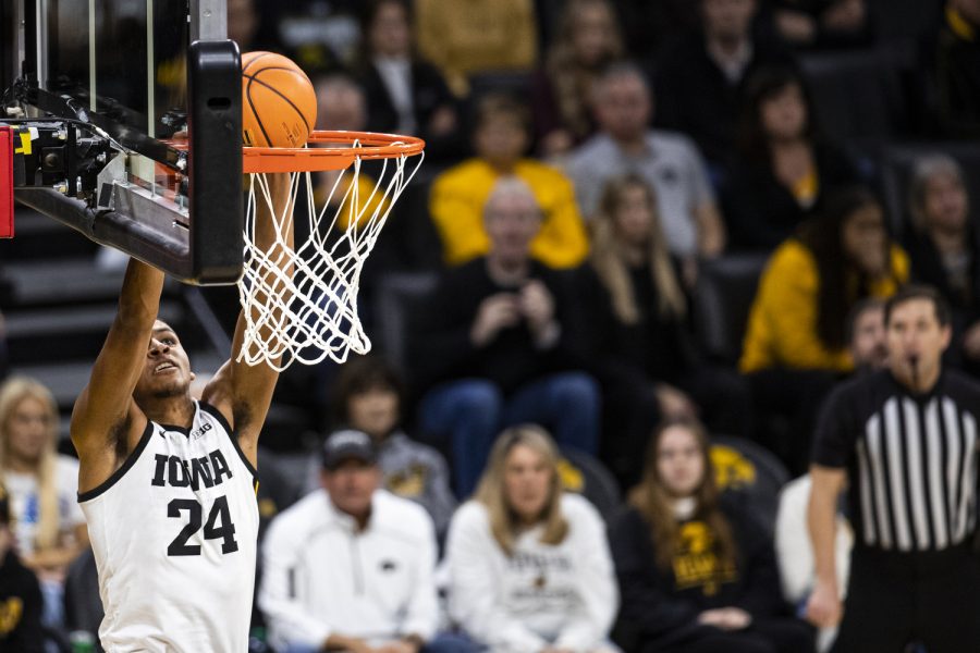 Iowa forward Kris Murray dunks the basketball during a men’s basketball game between Iowa and Maryland at Carver-Hawkeye Arena in Iowa City on Sunday, Jan. 15, 2023. The Hawkeyes defeated the Terrapins, 81-67.