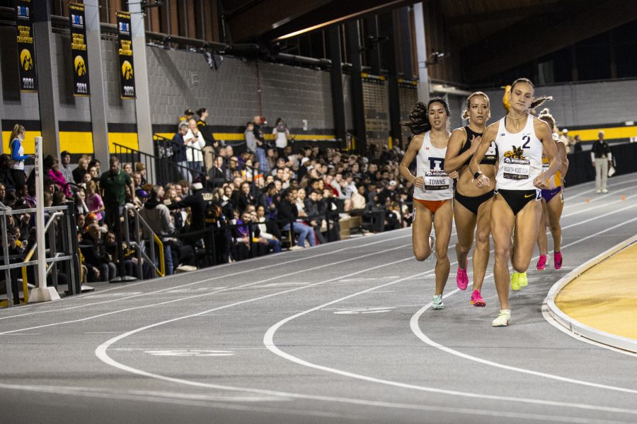 Iowa’s Grace Bookin-Nosbisch leads her heat of the women’s 800-meter premier during the Larry Wieczorek Invitational at the Iowa Indoor Track Facility in Iowa City on Saturday, Jan. 21, 2023. Nosbisch won her heat and finished third overall with a time of 2:10.82. The meet also hosted the Hawkeye Pro Classic for the American Track League.