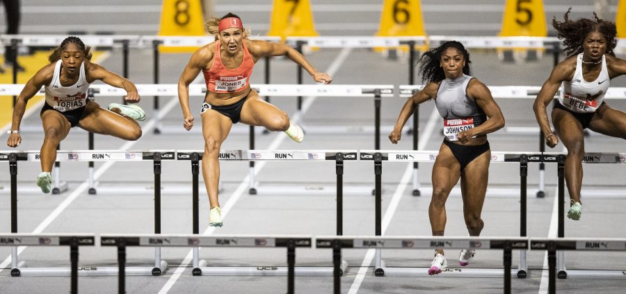 From left to right: Iowa’s Tionna Tobias, unattached Lolo Jones, USA’s Alaysha Johnson, and Iowa’s Myreanna Bebe compete in a prelim for the women’s 60-meter hurdles during the Larry Wieczorek Invitational at the Iowa Indoor Track Facility in Iowa City on Saturday, Jan. 21, 2023. All four runners qualified for the finals. The meet also hosted the Hawkeye Pro Classic for the American Track League.