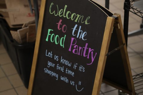 A welcome sign is seen at the Food Pantry in the Iowa Memorial Union in Iowa City on Friday, Jan. 27, 2023.