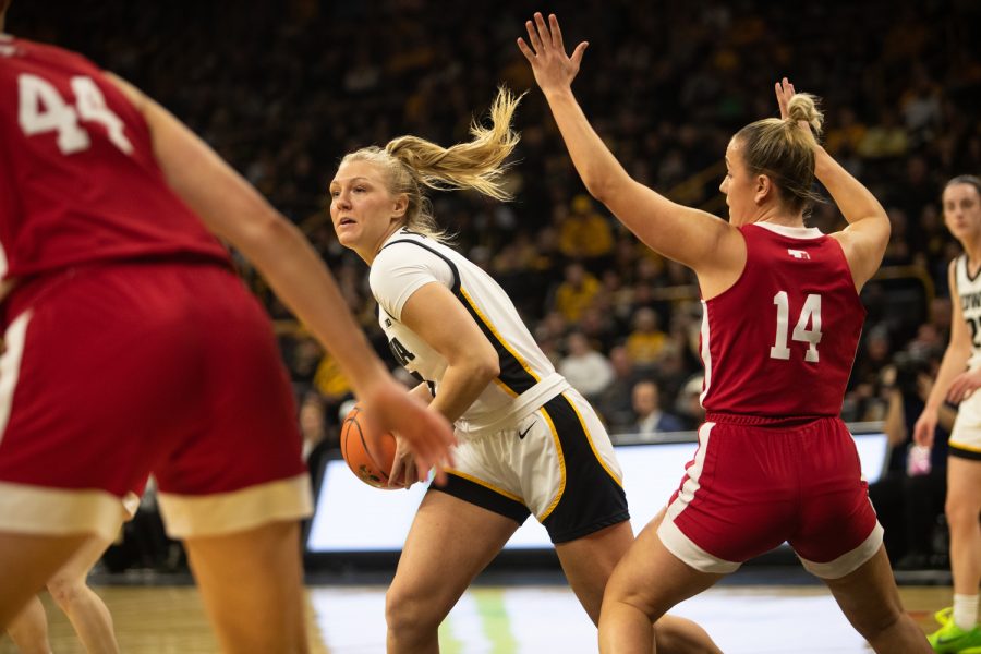 Iowa guard Sydney Affolter looks to pass during a women’s basketball game between No. 10 Iowa and Nebraska at Carver-Hawkeye Arena in Iowa City on Saturday, Jan. 23, 2022. The Hawkeyes defeated the Huskers, 80-76.