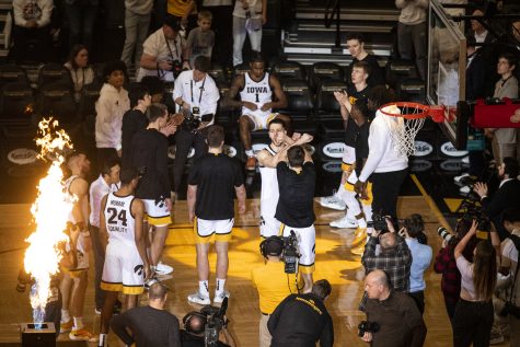Iowa forward Filip Rebraca walks out for the starting lineup introductions during a men’s basketball game between Iowa and Rutgers at Carver-Hawkeye Arena in Iowa City on Sunday, Jan. 29, 2023. Rebraca recorded six rebounds. The Hawkeyes defeated the Scarlet Knights, 93-82.