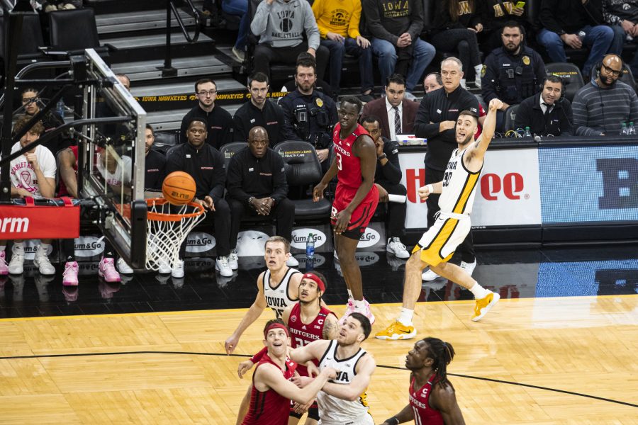 Iowa guard Connor McCaffery watches his 3-point shot attempt during a men’s basketball game between Iowa and Rutgers at Carver-Hawkeye Arena in Iowa City on Sunday, Jan. 29, 2023. McCaffery scored 11 points. The Hawkeyes defeated the Scarlet Knights, 93-82.