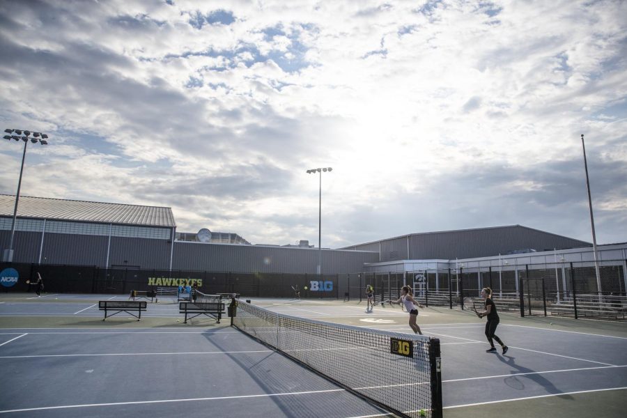 The Iowa tennis team participates in drills during a practice for the Iowa tennis team at the Hawkeye Tennis & Recreation Complex in Iowa City on Tuesday, Oct. 11, 2022.