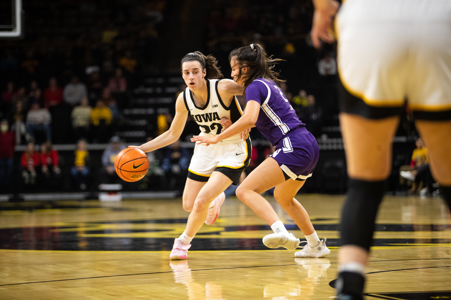 Iowa guard Caitlin Clark drives to the rim on the court during a women’s basketball game between Iowa and Northwestern at Carver-Hawkeye Arena in Iowa City on Wednesday, Jan. 11, 2023. The Hawkeyes defeated the Wildcats, 93-64.