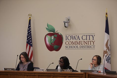 Iowa City Community School District board members react during a meeting at the Professional Development Center at the Educational Services Center in Iowa City on Tuesday, Jan. 31, 2023. 