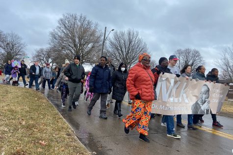 Iowa City community members march in the Unity Rally and March in Iowa City on Monday, Jan. 16, 2023. 