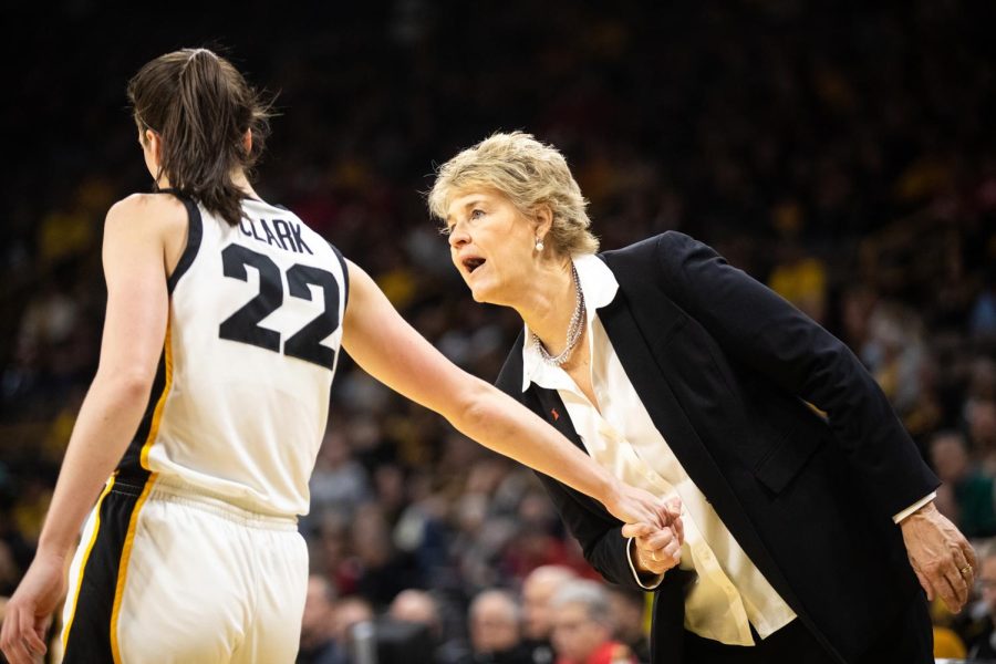 Iowa+head+coach+Lisa+Bluder+grabs+guard+Caitlin+Clark%E2%80%99s+hand+during+a+women%E2%80%99s+basketball+game+between+Iowa+and+Northwestern+at+Carver-Hawkeye+Arena+in+Iowa+City+on+Wednesday%2C+Jan.+11%2C+2023.+The+Hawkeyes+defeated+the+Wildcats%2C+93-64.