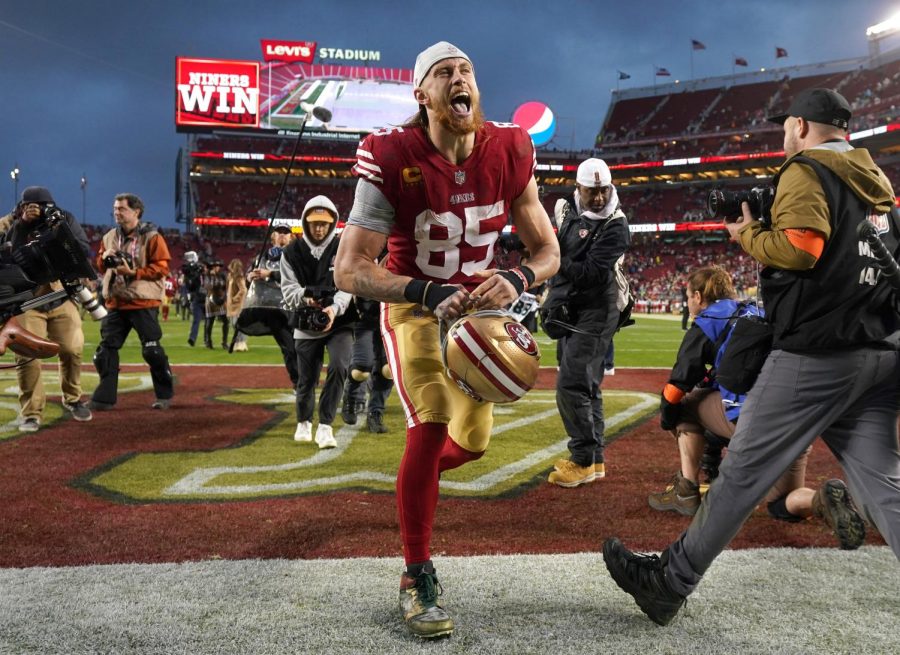 Jan 14, 2023; Santa Clara, California, USA; San Francisco 49ers tight end George Kittle (85) yells as he walks off the field after defeating the Seattle Seahawks in a wild card game at Levis Stadium. 
