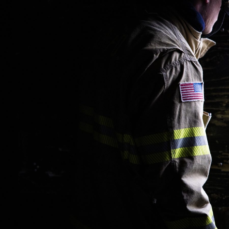 An American flag patch is seen on a firefighter’s coat at a training tower in Cedar Rapids on Monday, Jan. 2, 2023.