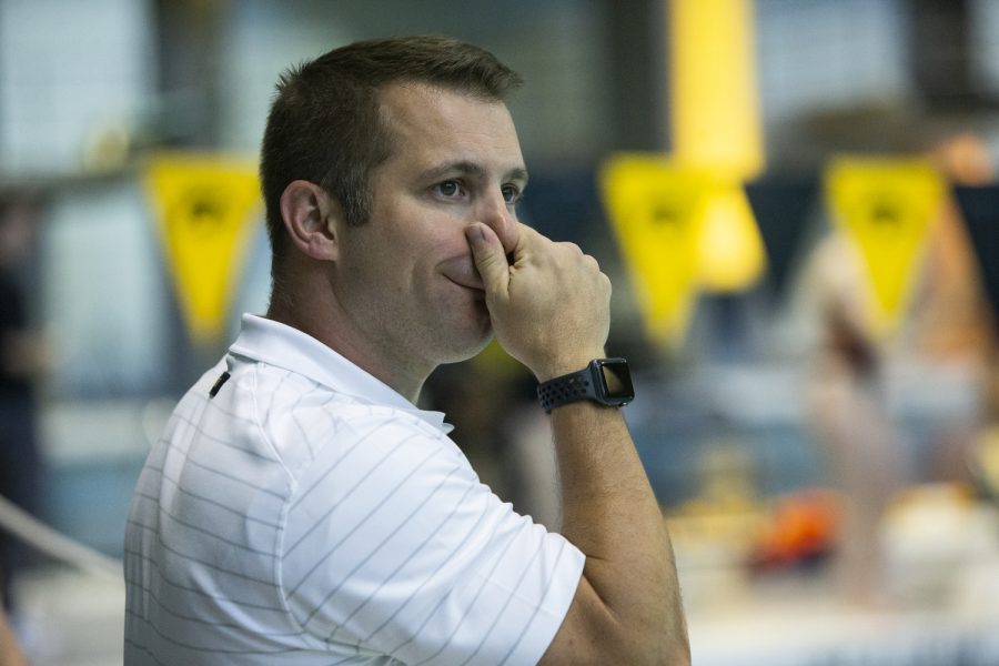 Iowa’s head coach Nathan Mundt reacts during a women’s swim and dive meet at the Campus Recreation and Wellness Center in Iowa City, Iowa on Saturday, January 14, 2023.