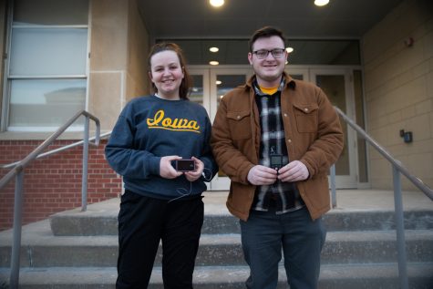 University of Iowa students Claire Hennessy and Jarod Kaufman pose with their insulin pumps for a portrait at the Iowa Memorial Union on Jan. 31 2023. Hennessy and Kaufman have type one diabetes and are part of the student organization Type1Hawks at the University of Iowa, a group which  focusses on diabetes education and activism. 