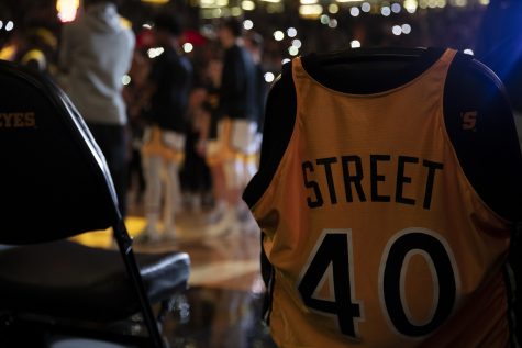 The jersey of former Iowa player Chris Street is seen while Iowa players are introduced before a men’s basketball game between Iowa and Northwestern at Carver-Hawkeye Arena in Iowa City on Tuesday, Jan. 31, 2023. The jersey was placed to honor the memory of Street. The Hawkeyes defeated the Wildcats, 86-70.