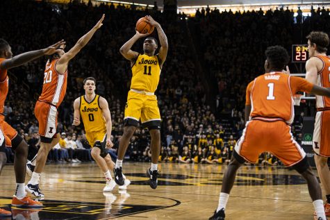 Iowa guard Tony Perkins takes a shot during a men’s basketball game between Iowa and Illinois at Carver-Hawkeye Arena in Iowa City on Saturday, Feb. 4, 2023. Perkins scored 32 points. The Hawkeyes defeated the Illini, 81-79.