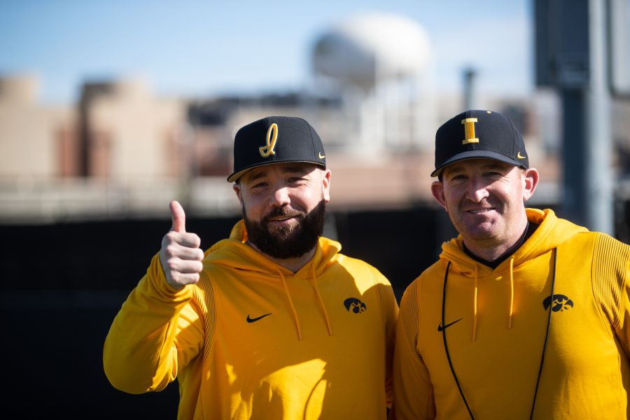Iowa+assistant+coaches+Sean+McGrath+and+Marty+Sutherland+give+a+thumbs+up+during+the+Iowa+mens+baseball+media+day+at+Duane+Banks+Baseball+Stadium+in+Iowa+City+on+February+8%2C+2023.+With+many+new+players+on+the+field%2C+head+coach+Rick+Heller+has+his+sights+on+Omaha.
