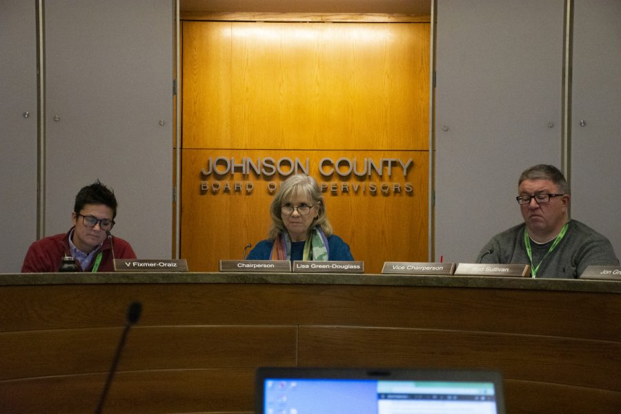 The Johnson County Board of Supervisors listens to speakers at a meeting in the Johnson County Administration Building on Wednesday, Feb. 15, 2023.
