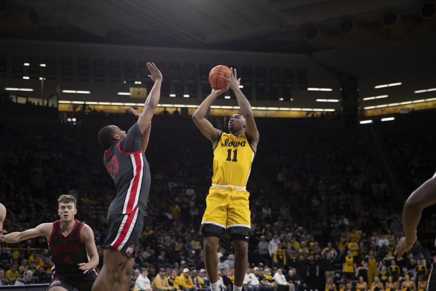 Iowa guard Tony Perkins shoots the ball during a men’s basketball game between Iowa and Ohio State at Carver-Hawkeye Arena in Iowa City on Thursday, Feb. 16, 2023. The Hawkeyes defeated the Buckeyes, 92-75. Perkins scored 24 points.