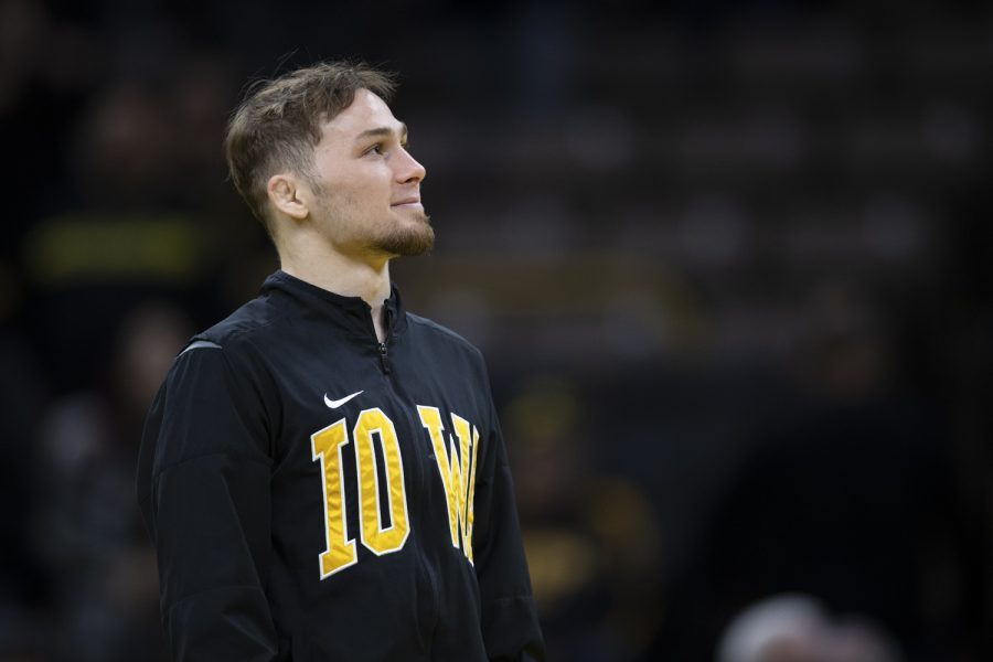 Iowa%E2%80%99s+No.+1+nationally+ranked+125-pound+Spencer+Lee+smiles+to+the+crowd+at+the+end+of+a+wrestling+dual+between+No.+2+Iowa+and+No.+6+Oklahoma+State+in+Carver-Hawkeye+Arena+on+Sunday+Feb.+19%2C+2023.+The+Hawkeyes+defeated+the+Cowboys%2C+28-7.