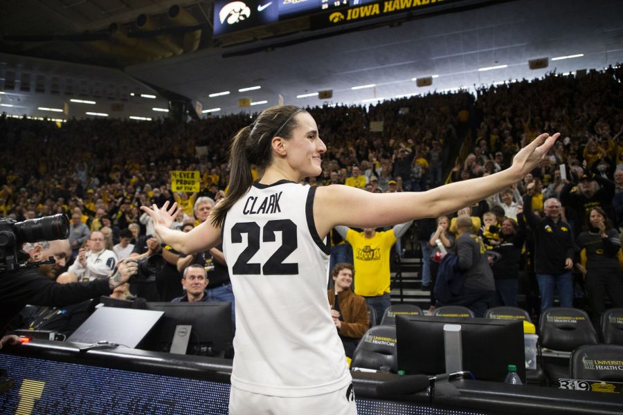 Iowa guard Caitlin Clark celebrates after victory over No. 2 Indiana at Carver-Hawkeye Arena in Iowa City on Sunday, Feb. 26, 2023. The Hawkeyes defeated the Hoosiers, 86-85. Clark recorded 34 points, nine defensive rebounds, and nine assists.