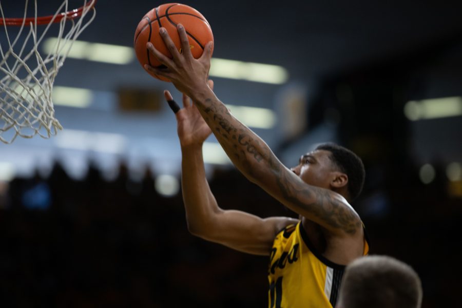 Iowa guard Tony Perkins jumps for a layup during a men’s basketball game between Iowa and Michigan State at Carver-Hawkeye Arena in Iowa City on Saturday, Feb. 25, 2023. The Hawkeyes defeated the Spartans, 112-106. Perkins scored 24 points and had 6 assists.