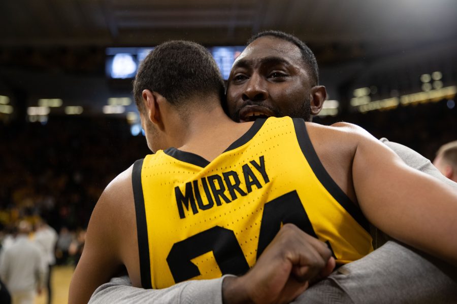 Iowa forward Kris Murray embraces Director of Player Development Tristan Spurlock after a men’s basketball game between Iowa and Michigan State at Carver-Hawkeye Arena in Iowa City on Saturday, Feb. 25, 2023. The Hawkeyes defeated the Spartans, 112-106. Murray scored 26 points and 4 assists.