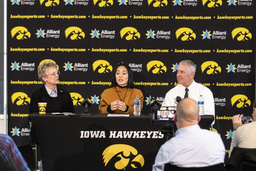 Clarissa Chun speaks with reporters after being introduced as the new women’s wrestling coach for the University of Iowa at Carver-Hawkeye Arena in Iowa City on Friday, Nov. 19, 2021. Chun won an Olympic bronze medal for Team USA in the 2012 Olympics.