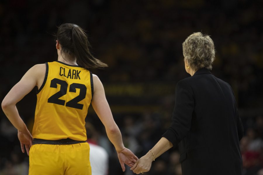 Iowa head coach Lisa Bluder and Iowa guard Caitlin Clark stand on the sideline during a women’s basketball game between No. 7 Iowa and Wisconsin at Carver-Hawkeye Arena on Wednesday, Feb. 15, 2023. Clark had eight assists. The Hawkeyes defeated the Badgers, 91-61. 