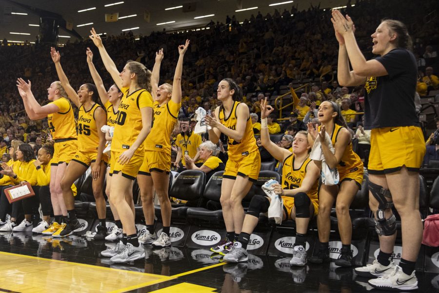 The Iowa bench cheers during a women’s basketball game between No. 7 Iowa and Wisconsin at Carver-Hawkeye Arena on Wednesday, Feb. 15, 2023. The Hawkeyes defeated the Badgers, 91-61. 