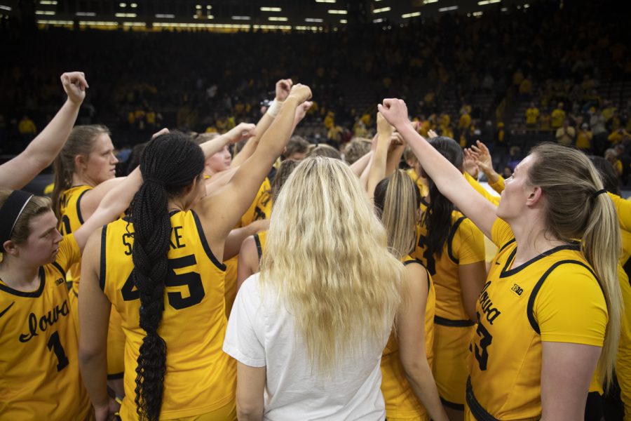 Iowa’s women’s basketball team huddles during a women’s basketball game between No. 7 Iowa and Wisconsin at Carver-Hawkeye Arena on Wednesday, Feb. 15, 2023. The Hawkeyes defeated the Badgers, 91-61. 