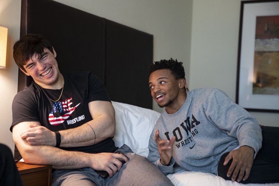 Iowa’s 125-pound Charles Matthews (right) and Iowa’s 285-pound Tony Cassioppi (left) laugh in a hotel room at I Hotel and Illinois Conference Center in Champaign, Ill. on Sunday, Jan. 16, 2022. Iowa’s matchup against Illinois marked their 10th dual of the 2021-22 season and fourth Big Ten dual.  