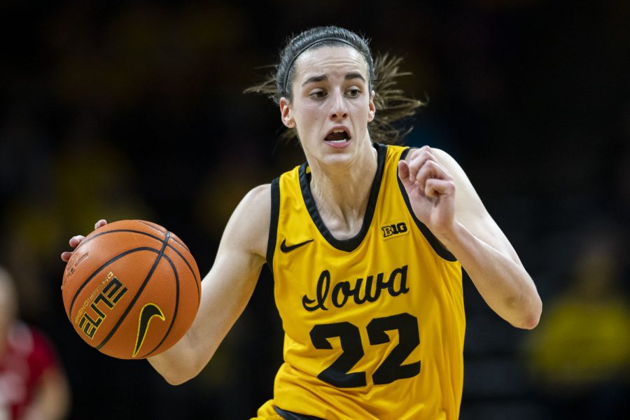 Iowa guard Caitlin Clark drives down the court during a women’s basketball game between No. 7 Iowa and Wisconsin at Carver-Hawkeye Arena on Wednesday, Feb. 15, 2023. The Hawkeyes defeated the Badgers, 91-61. 