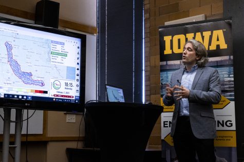 Professor Ibrahim Damir performs a demonstration of a flood prediction during a press conference for the University of Iowa’s new Center for Hydrologic development at the Iowa Flood Center in Iowa City on Wednesday, Feb. 1, 2023. The center aims to better the ability to predict floods and droughts.