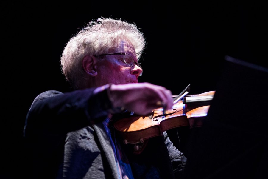 David Harrington, a member of the Kronos Quartet, performs during the Michigan premiere of A Thousand Thoughts  at Detroit Film Theatre on April 12, 2019. 