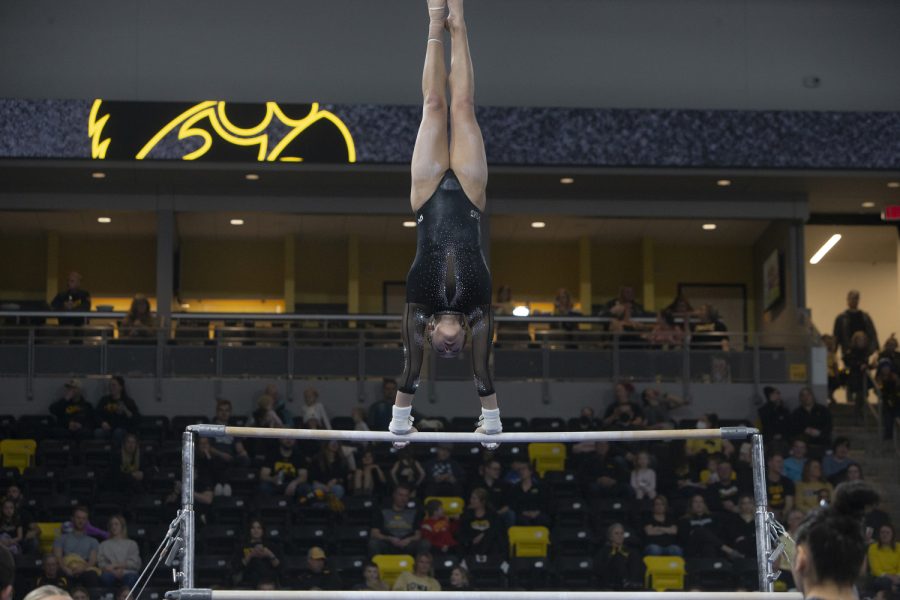 Iowa’s Karina Muñoz competes on bars during a gymnastics meet between No. 17 Iowa and No. 12 Michigan State at the Xtream Arena on Saturday, Feb. 11, 2022. Muñoz scored 9.850. The Hawkeyes defeated the Spartans 196.150-195.725.