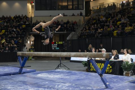 Iowa’s Alexa Ebeling competes on beam during a gymnastics meet between No. 17 Iowa and No. 12 Michigan State at the Xtream Arena on Saturday, Feb. 11, 2022. Ebeling scored 9.800. The Hawkeyes defeated the Spartans, 196.150-195.725.