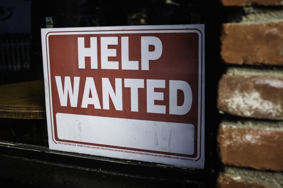 Help wanted sign on business window